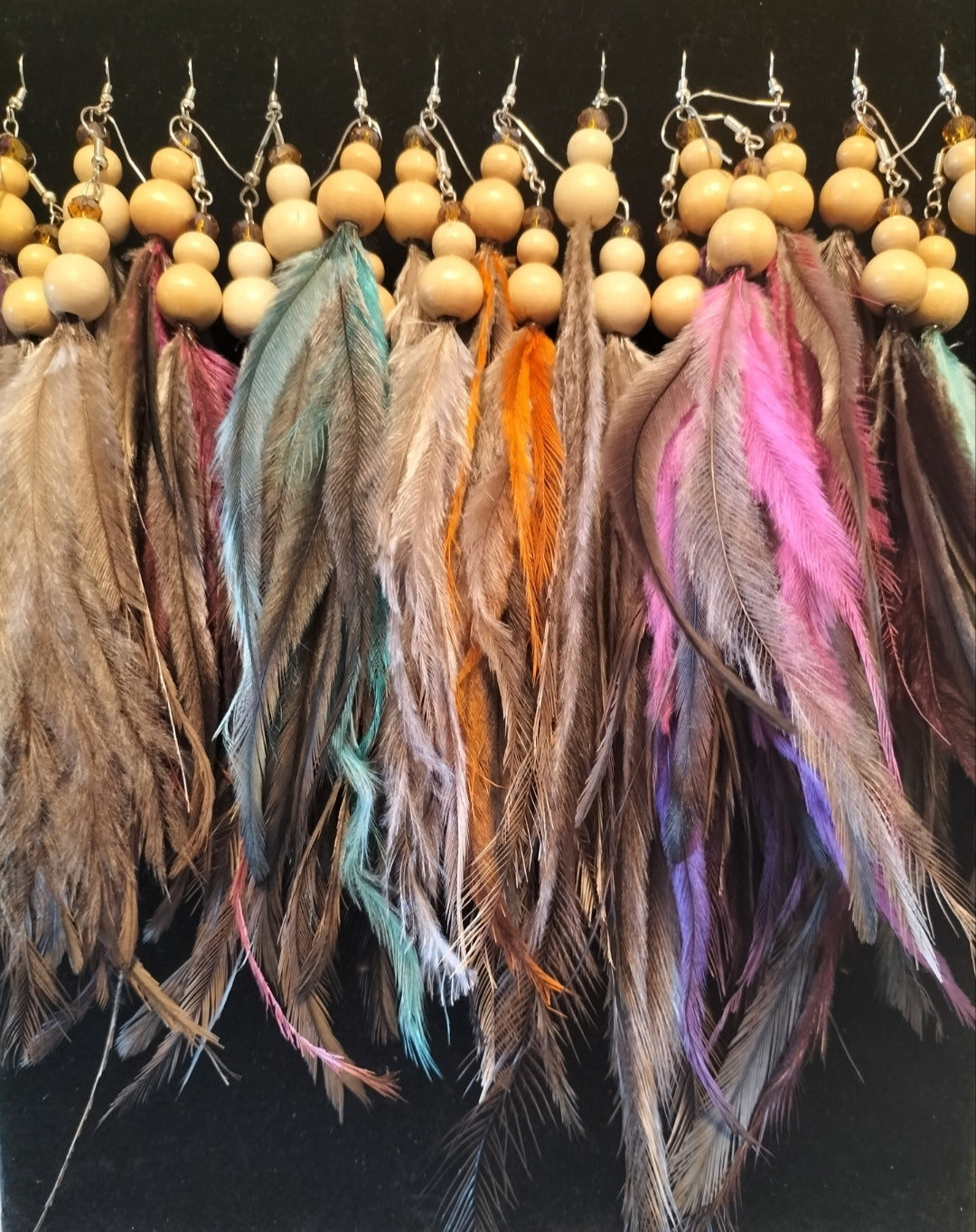 Emu Feather Earrings with Surgical steel hooks.